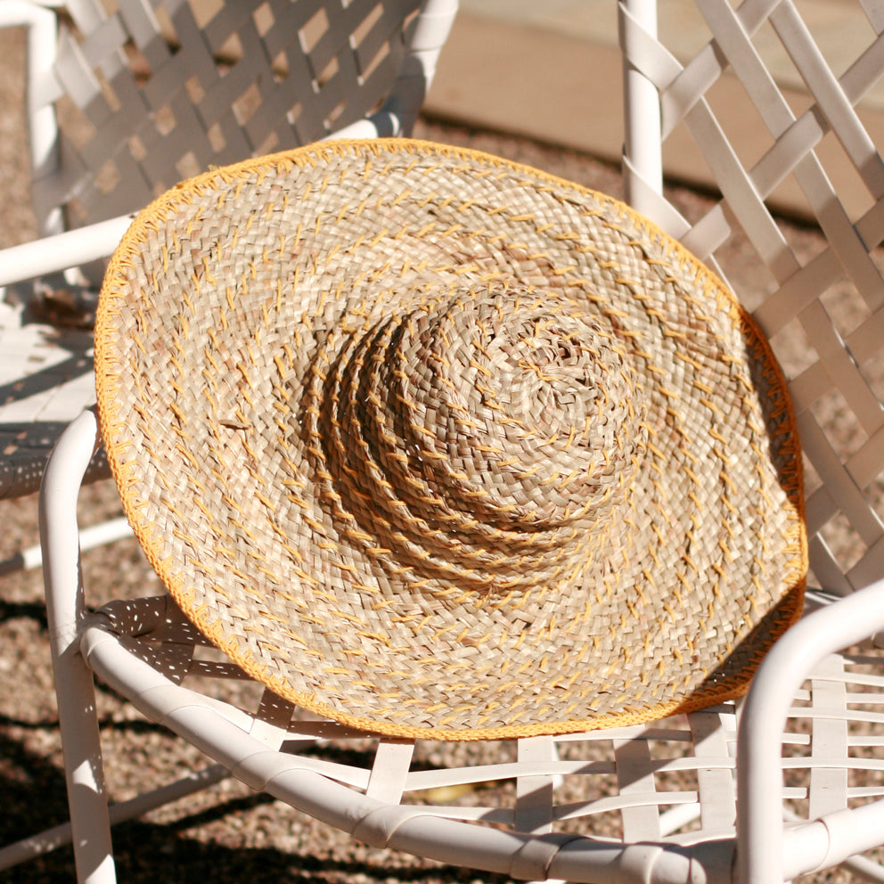 Balinese Pecatu Wide Round Straw Hat In Butter Yellow