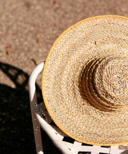 Balinese Pecatu Wide Round Straw Hat In Butter Yellow